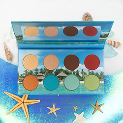 Palomino Paradise Eyeshadow Palette has an array of neutral tones and pops of Reds, Greens, and Blues representing Caribbean islands 